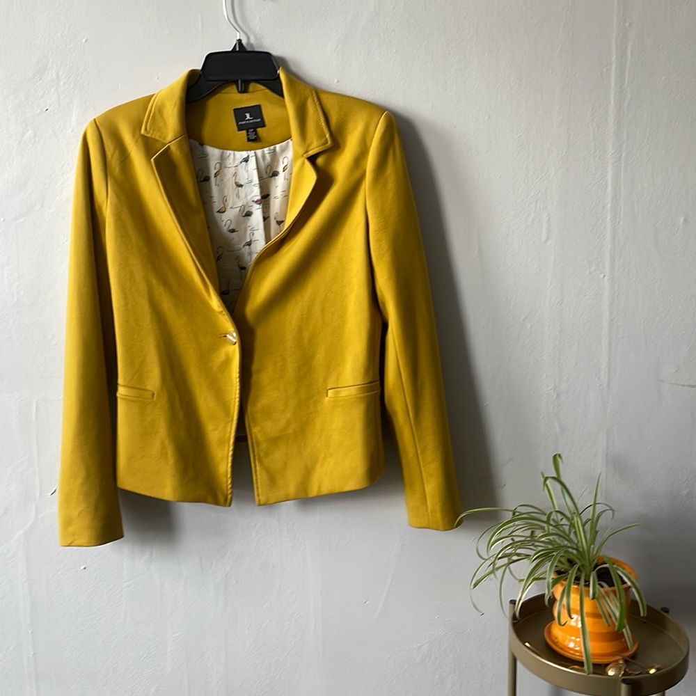 Mustard yellow blazer.